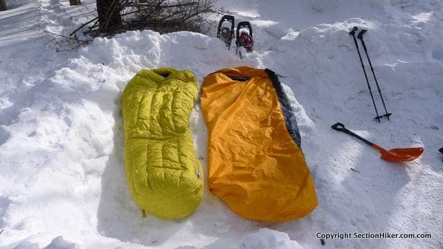 Is it better to buy a sleeping bag with a gore tex shell or to just use a bivy sack?