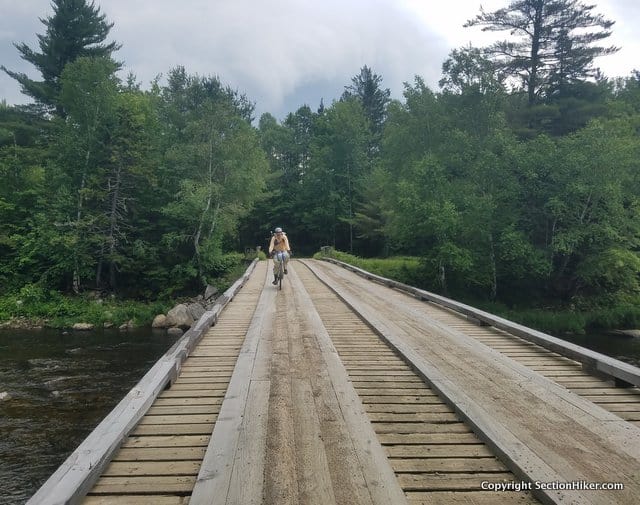 Outrunning a pending thunderstorm - bridge over the Dead Diamond River, NH