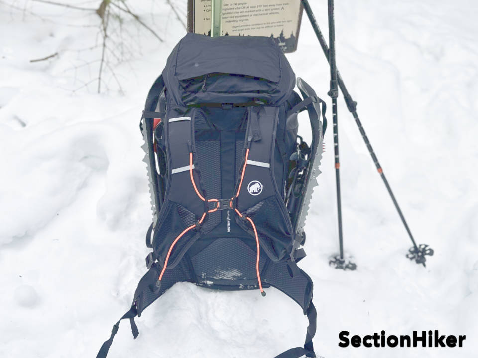 The pack has a vest style harness which distributes weight across the chest.