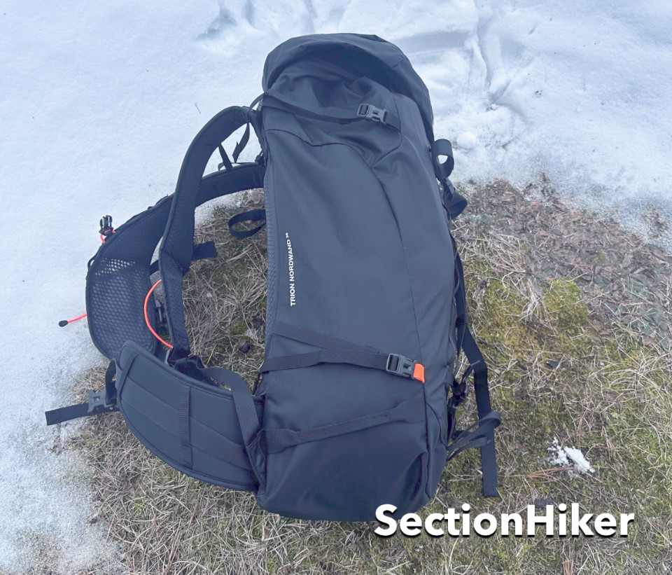 The pack has long side webbing straps that close with buckles and are great for strapping snowshoes to the side of the pack.